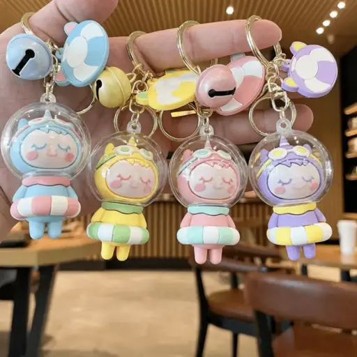 [400870] បន្តោងតុក្កតាដែកមានកណ្ដឹងរូបចម្រុះ